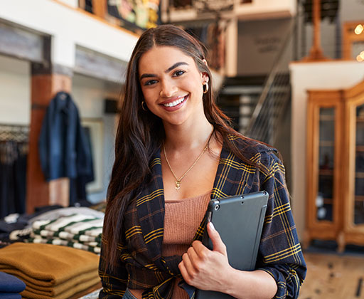 Small business owner at her door
